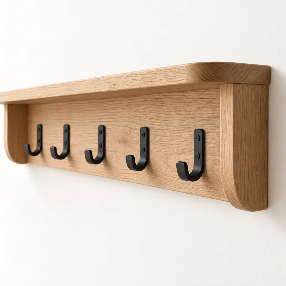 Alder Wall Rail & Shelf, detail of rounded shelf ends and evenly spaced hooks