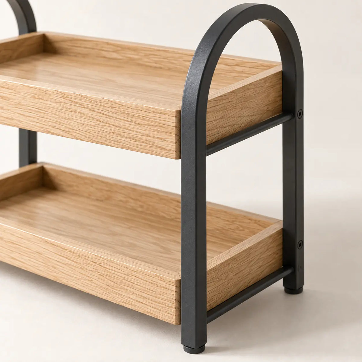 Arc Counter Organizer, detail of arched steel profile and two oak trays