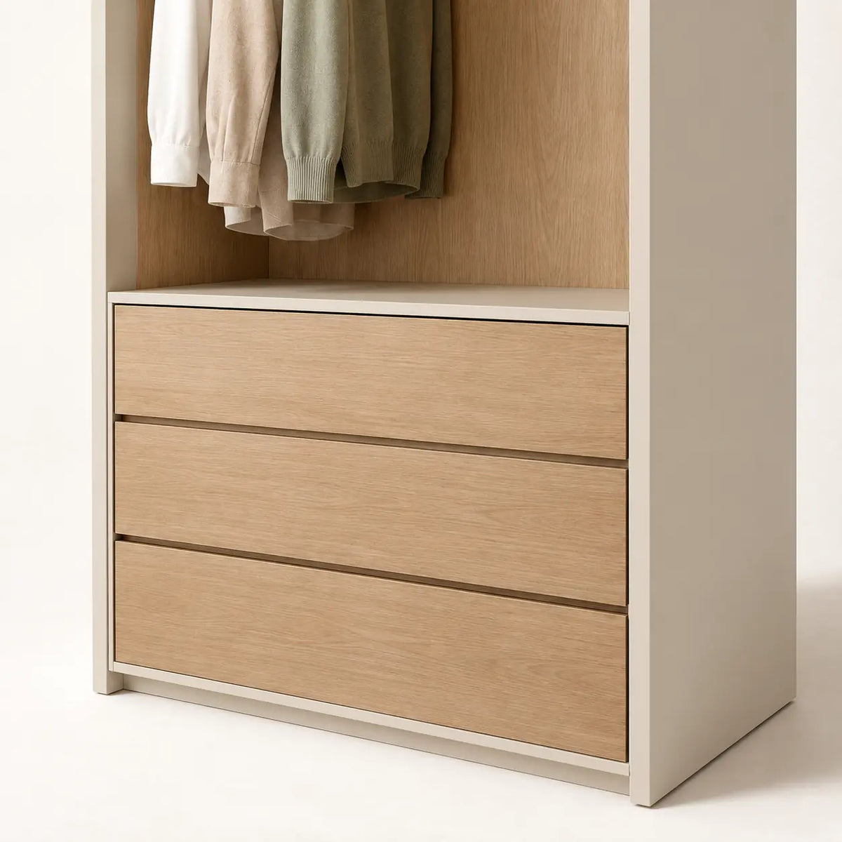 Arden Wardrobe System, detail of clear hanging bay and three aligned lower drawers
